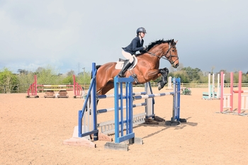 Emily Watts wins the First Equissage Pulse Senior British Novice Second Round at Tushingham Arena